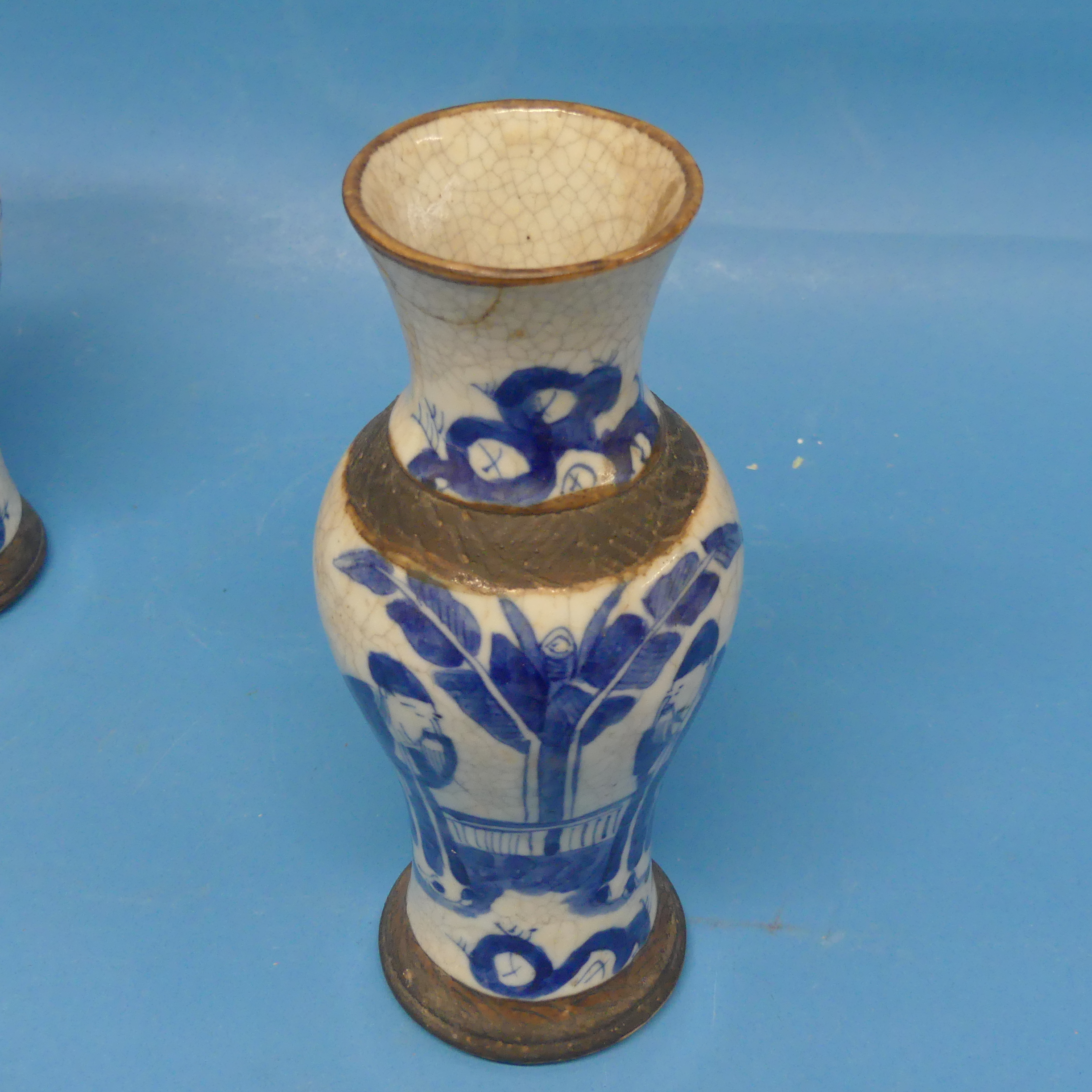 A pair of Chinese crackle glaze Vases, in the blue and white palette, with four character mark to - Image 2 of 8