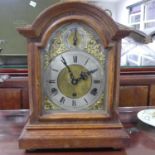 An early 20thC oak cased chiming Mantel Clock, with Kienzle 8-day movement, no. 38810, striking on