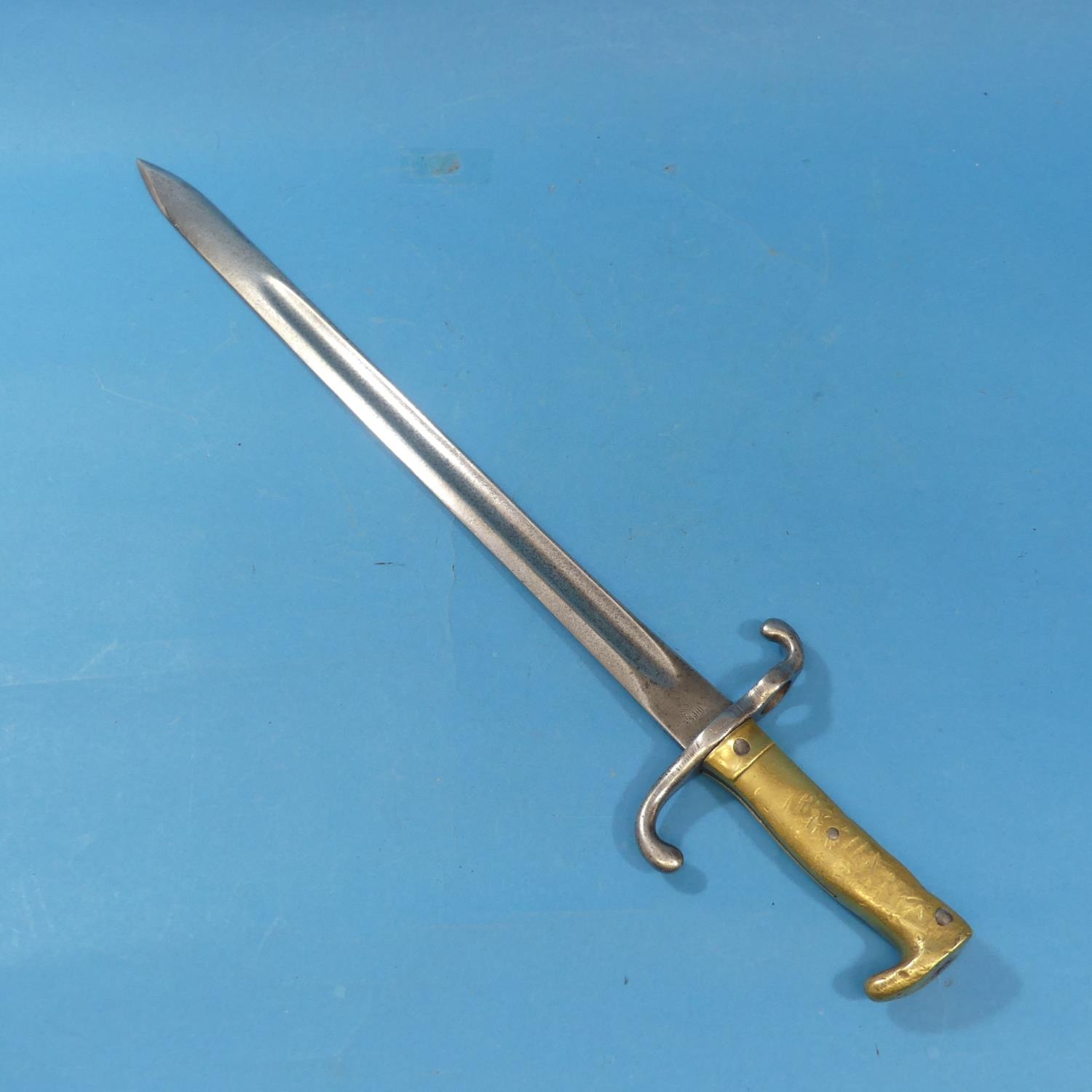 A Mauser Bayonet 1871, the back edge marked 'W75' beneath a crown, with a hooked quillon and a brass - Image 2 of 4