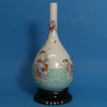 A 19thC Chinese porcelain famille rose Bottle Vase, the ovoid body with slender neck, painted