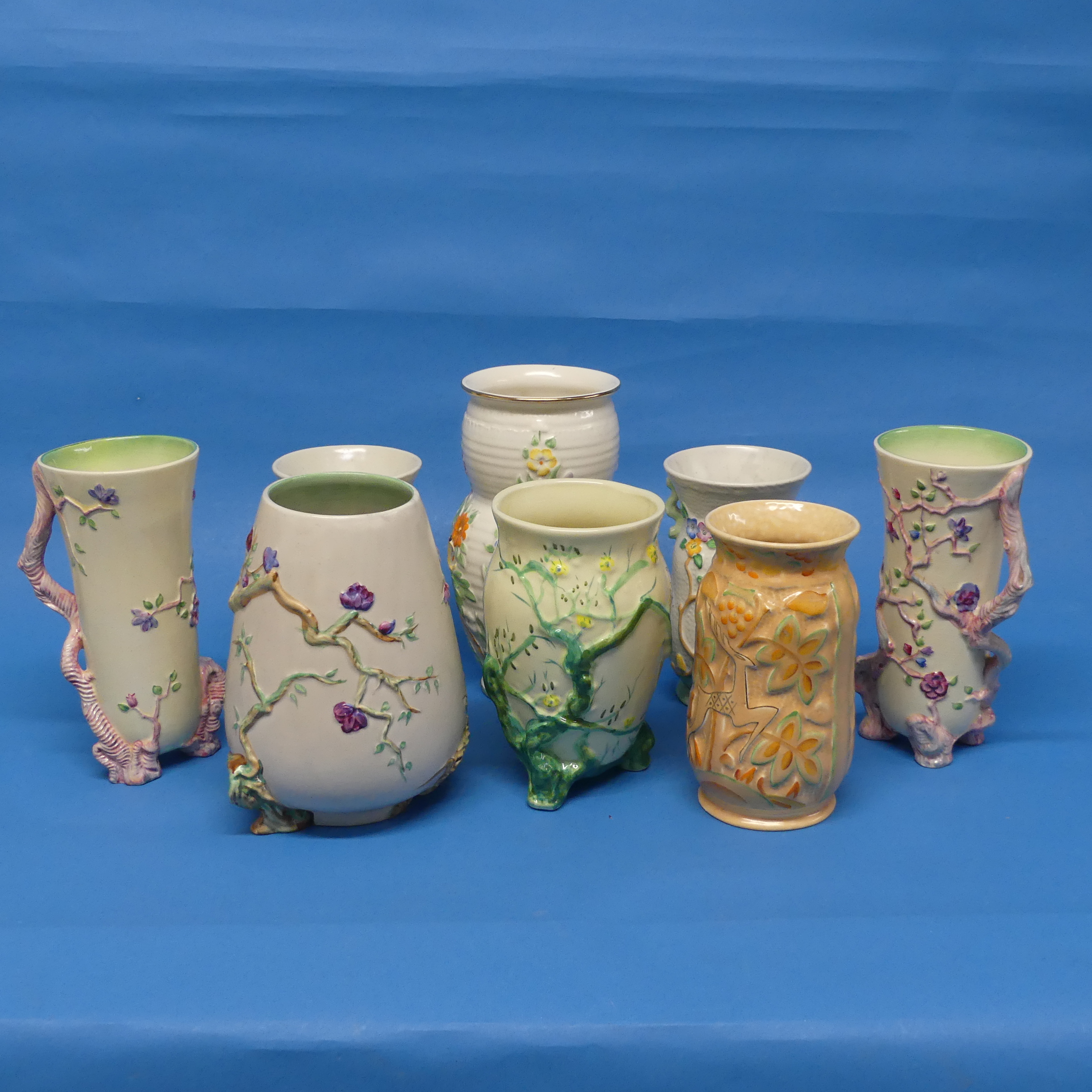A pair of Clarice Cliff 'Indian Tree' pattern Vases, one with chip to foot, marks for Newport,