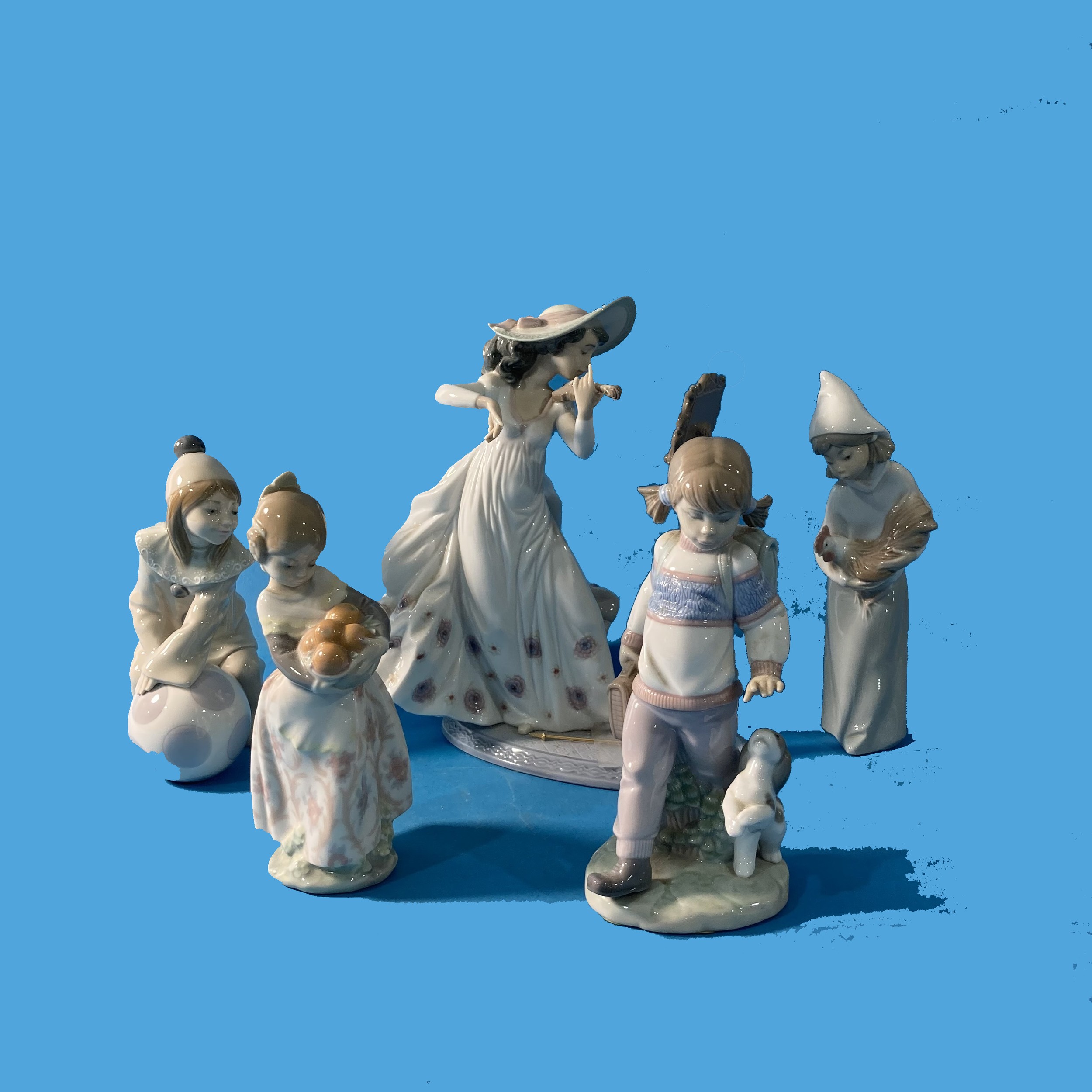 A small quantity of Lladro, to include a Vioinist, damaged, together with four others (5)