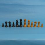 A an early 20thC Staunton Pattern boxwood and ebony Chess Set, King H 11.25cm, replacement black