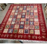 Tribal Rugs; a superb hand-knotted Zeigler carpet, with dark red ground woven all over with