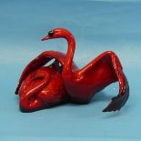 A Royal Doulton flambe Images of Fire 'Nestling Down' Figure, depicting a swan group, factory