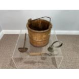 An antique wooden Milking Pail, 72cm x 72cm (excluding handle), together with an iron ladle,