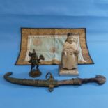 An antique oriental bronze mythical figure, with scrolled tail, standing holding hat and sceptre,