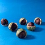 A small quantity of ornamental Chestnuts, possibly by Mark Richard Hall, of varying forms (6)