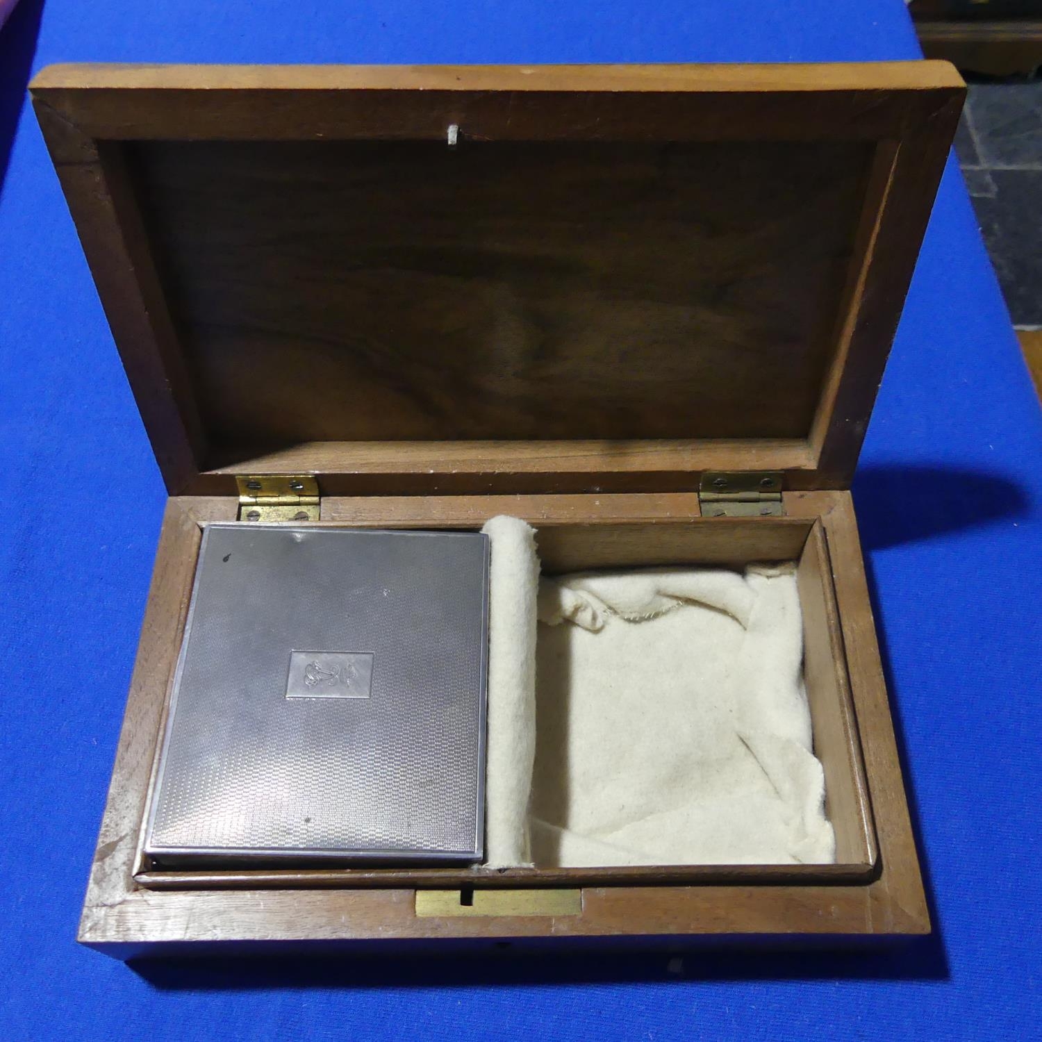 A Silver Mappin and Webb Cigarette Box, marks for London, 1939, together with a Walnut Box,