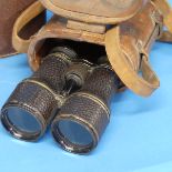 A pair of WW1 period Officer's Binoculars, by Colmont Paris, in brown leather case, together with