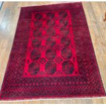 Tribal Rugs: a good red ground Afghan hand knotted Carpet, the whole finely woven with tekke and