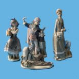 A small quantity of Lladro, to include a Magician, a Lady feeding Ducks, a young Fisherman and one