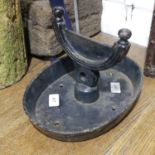 An antique cast iron Boot Scraper, painted in black, 30cm wide x 21cm high.