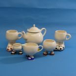 A novelty Carltonware 'Walking' Tea Set, to include Teapot, two Tea Cups, Cream Jug, Sugar Bowl