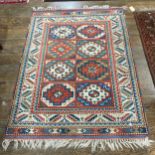 Tribal Rugs: a Turkish hand knotted wool rug, the whole woven with bold square and geometric