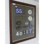 An attractive display of vintage House Numbers, including individual brass numbers, enamel and