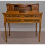 A reproduction yew wood Lady's Desk, the inlaid front with hinged and inset leather sciver, above