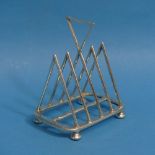 An Art Deco silver plated Toast Rack by Walker and Hall, in the manner of Christopher Dresser, W 9cm