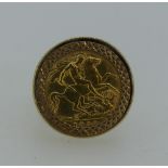 An Edwardian gold Half Sovereign, dated 1908, in 9ct yellow gold ring mount, approx total weight