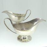 A pair of George V silver Sauce Boats, by Vander & Hedges (Tessier's), hallmarked London 1912, of