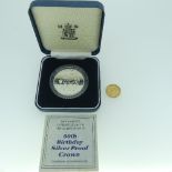 A George V gold Half Sovereign, dated 1911,together with a cased silver proof '90th Birthday' (of