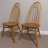 A pair of vintage Ercol Quaker Chairs, the hoop and stick back raised on H-stretcher, with impressed