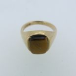 A 9ct yellow gold Signet Ring, set Tiger's Eye, Size W, approx total weight 8.4g.