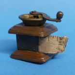 A vintage novelty Dressmakers' Measure, in the form of a Coffee Grinder (a/f)