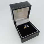 A pale sapphire single stone Ring, the oval facetted stone, 7.75mm x 8.5mm, claw set in 18ct
