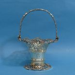 A George V silver swing handled Basket, by Josiah Williams & Co., hallmarked London, 1910, of