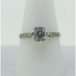 A single stone white sapphire Ring, the brilliant cut stone approx ¾ct, claw set in 9ct white