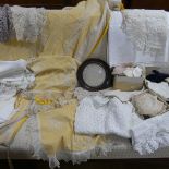 A quantity of Vintage Textiles, including crochet placemats, damask tablecloth, silk