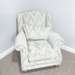 A modern Armchair, with grey and white zig-zagged velvet upholstery, W87cm x H94cm x D95cm.