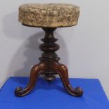 A Victorian rosewood adjustable Piano Stool, carved and turned tripod base, H 52cm