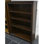 A late 20thc oak Open Bookcase, possibly Old Charm, with incised decoration and adjustable