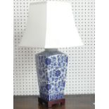 A modern Chinese blue and white Table Lamp, of square form, mounted on wooden plinth, with shade,