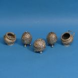 Five unmarked Indian silver Cruets, tested, including a pair of open salts, a pair of pepper