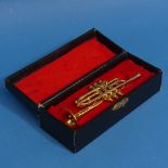 A cased miniature Trumpet, by The Music Gifts Co., in fitted case.