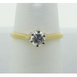 A single stone diamond Ring, the brilliant cut stone approx. ¼ct, claw set in white gold, the yellow