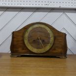 An Art Deco style walnut Napoleon Hat Mantel Clock, the back with makers label, 'Anglo-Swiss Watch