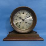 An American "Ship's Bell" mantel Clock, with 8-day striking movement, retailed by Goldsmiths &