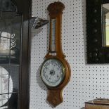 An Edwardian carved oak Aneroid Barometer, 78cm high.