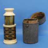 An early 19thC ivory and brass single draw Monocular, with gilt tooled leather to body, in velvet