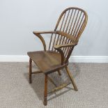 A 19th century Windsor Chair, with hoop back and straight stretchers, seat split and repaired.