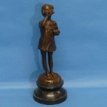 After Suzanne Bizard (French, 1873-1963), Girl blowing Bubbles, patinated bronze figure, impressed