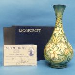 A Moorcroft 'Carousel' pattern bottle Vase, designed by Rachel Bishop, with impressed and painted