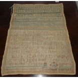 An early Victorian needlework sampler, dated 1844, worked with coloured threads on a linen ground,