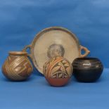 A native American pottery Vase, signed D Tosa Jemez to base, together with another similar and two