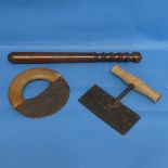 An early 20thC wooden truncheon, L 40cm, together with two vintage cutting tools (3)
