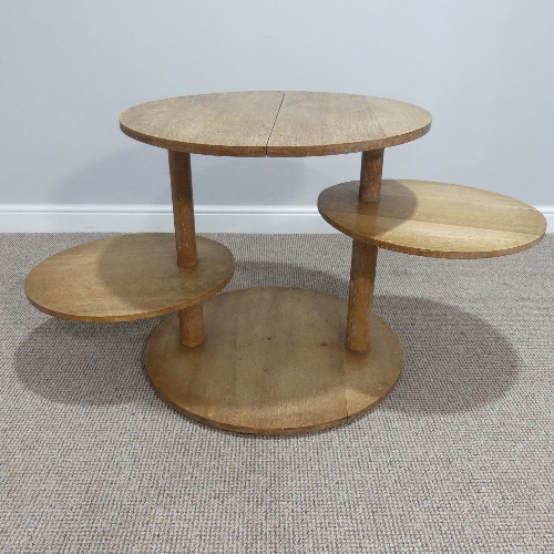 A Heals limed oak circular Book Table, circa 1930's, with two swing out circular tiers, the top with - Image 6 of 7